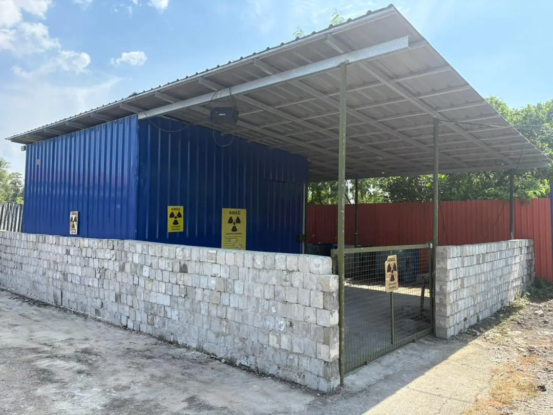 Radiography exposure enclosure with AWAS radiation warning signs at the CAST facility